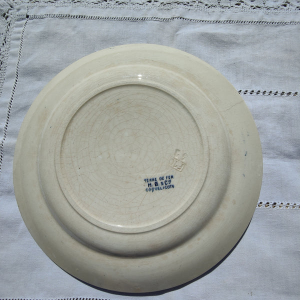 Assiette ancienne en terre de fer HB&C